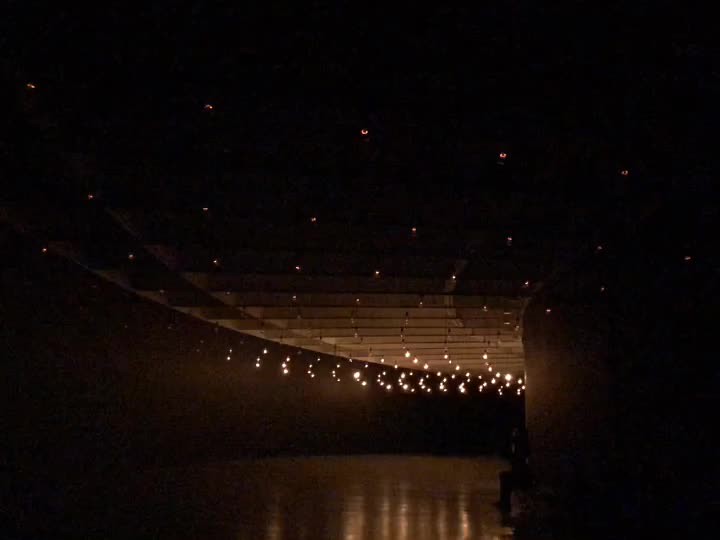 Art installation and wall hanging process in professional gallery setting